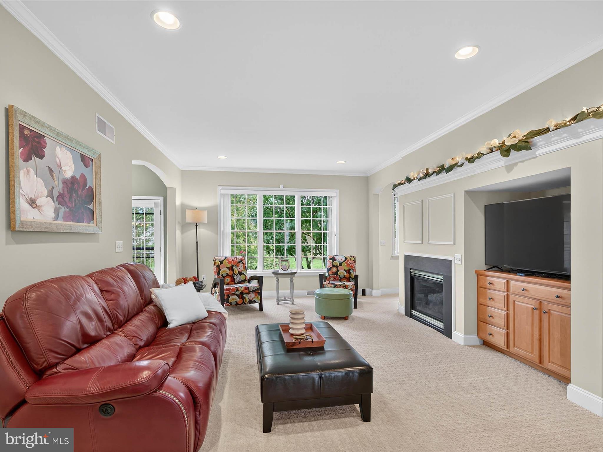 213 Barkay Crossing Lititz, PA 17543 - Photo 42 of 112 a living room with furniture and a fireplace