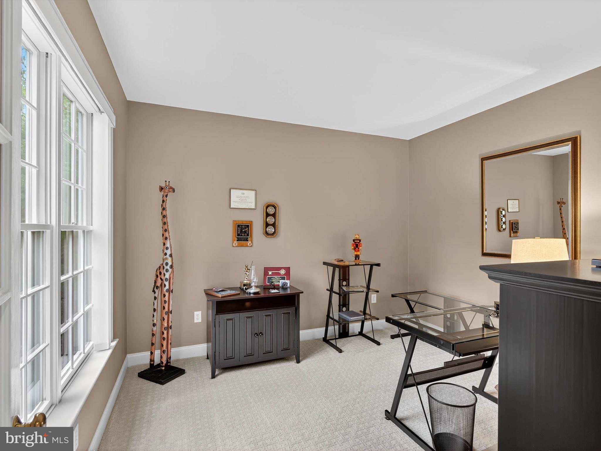 213 Barkay Crossing Lititz, PA 17543 - Photo 50 of 112 a view of a workspace with furniture and a window