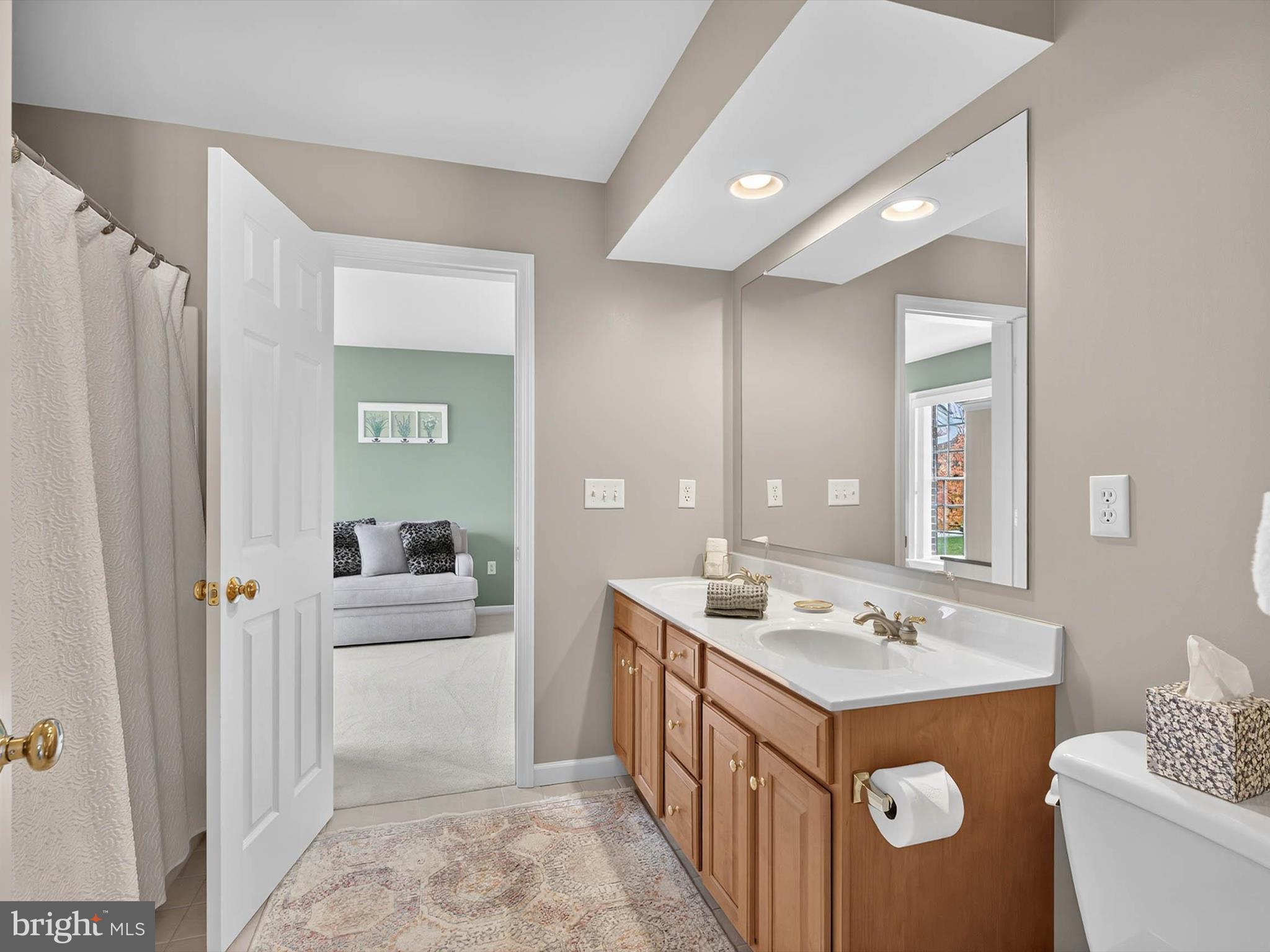 213 Barkay Crossing Lititz, PA 17543 - Photo 76 of 112 a bathroom with a sink double vanity and a bathtub