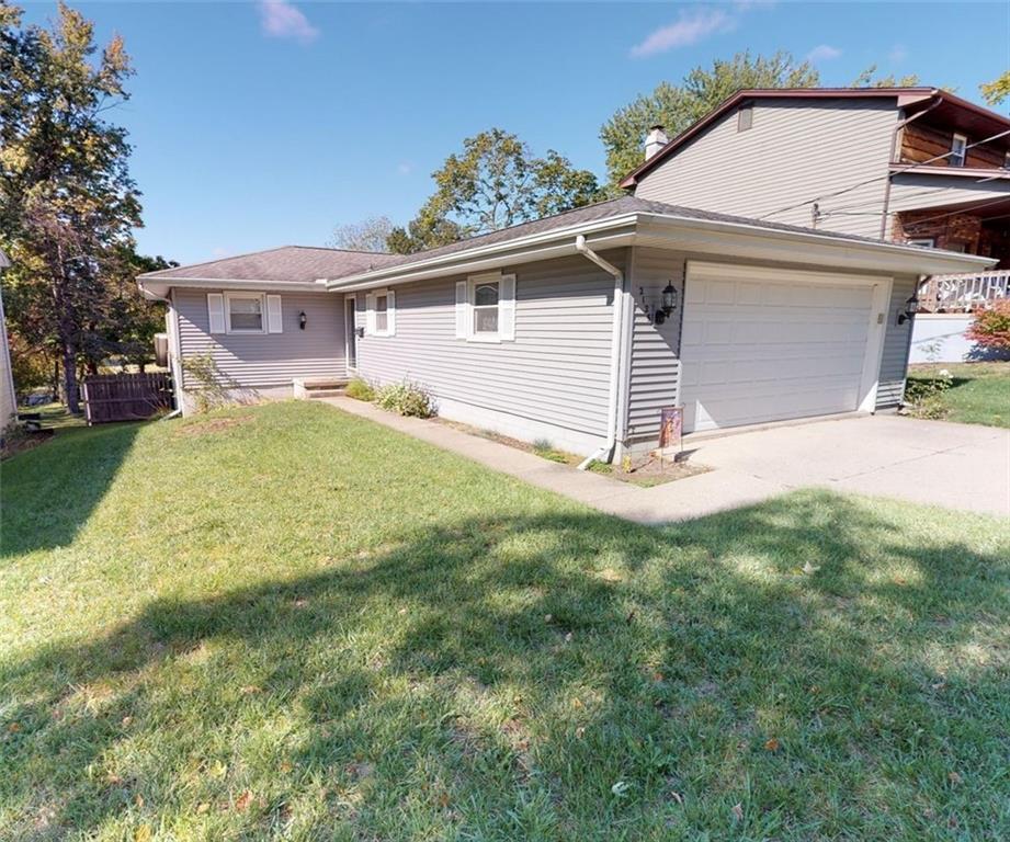 2125 North Summit Avenue Decatur, IL 62526 - Photo 1 of 1 a view of a house with backyard
