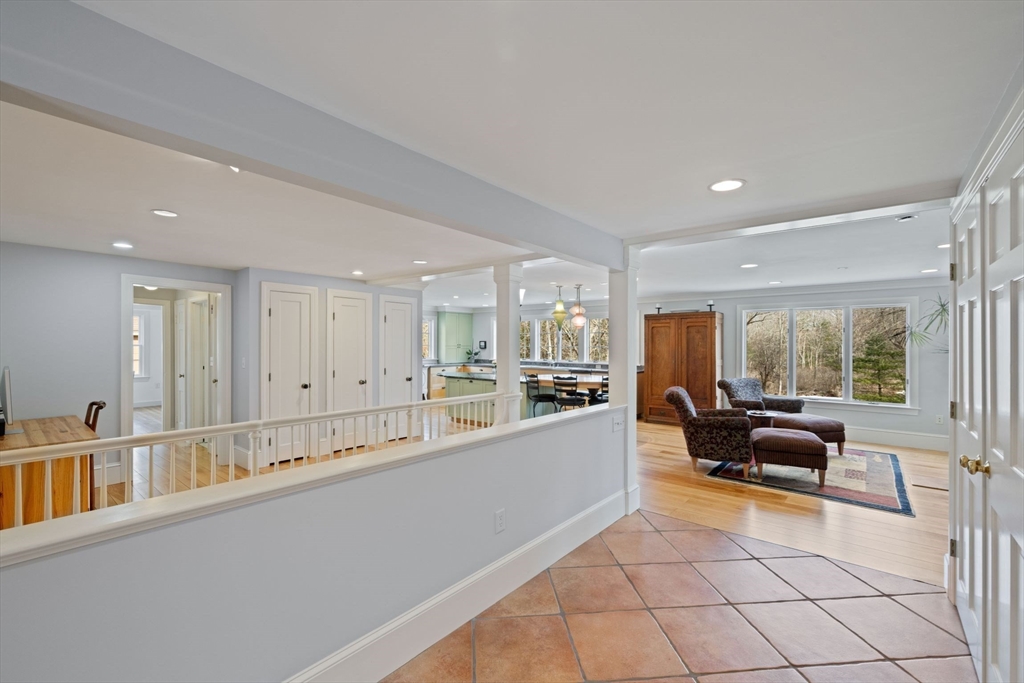 64 Holt Road Andover, MA 01810 - Photo 13 of 40 a large living room with stainless steel appliances granite countertop a couch and a large window