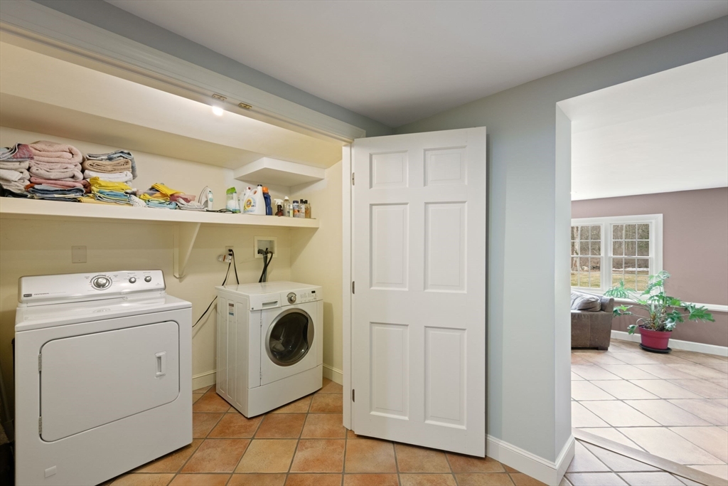 64 Holt Road Andover, MA 01810 - Photo 28 of 40 a utility room with dryer and washer
