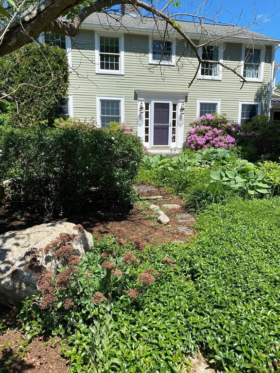 64 Holt Road Andover, MA 01810 - Photo 31 of 40 a front view of a house with a yard