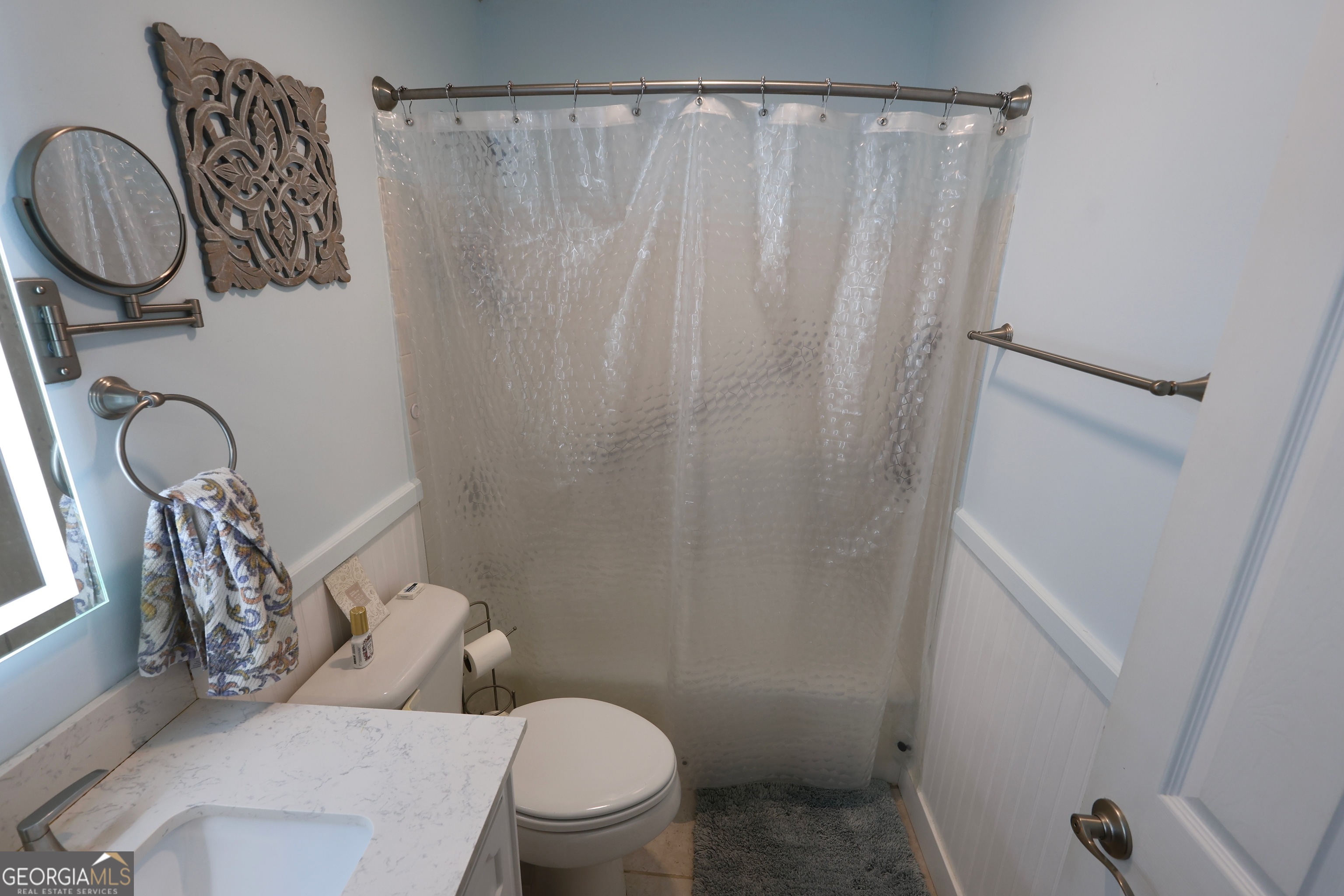 950 Old Jesup Road Brunswick, GA 31520 - Photo 17 of 20 a bathroom with a toilet and a mirror