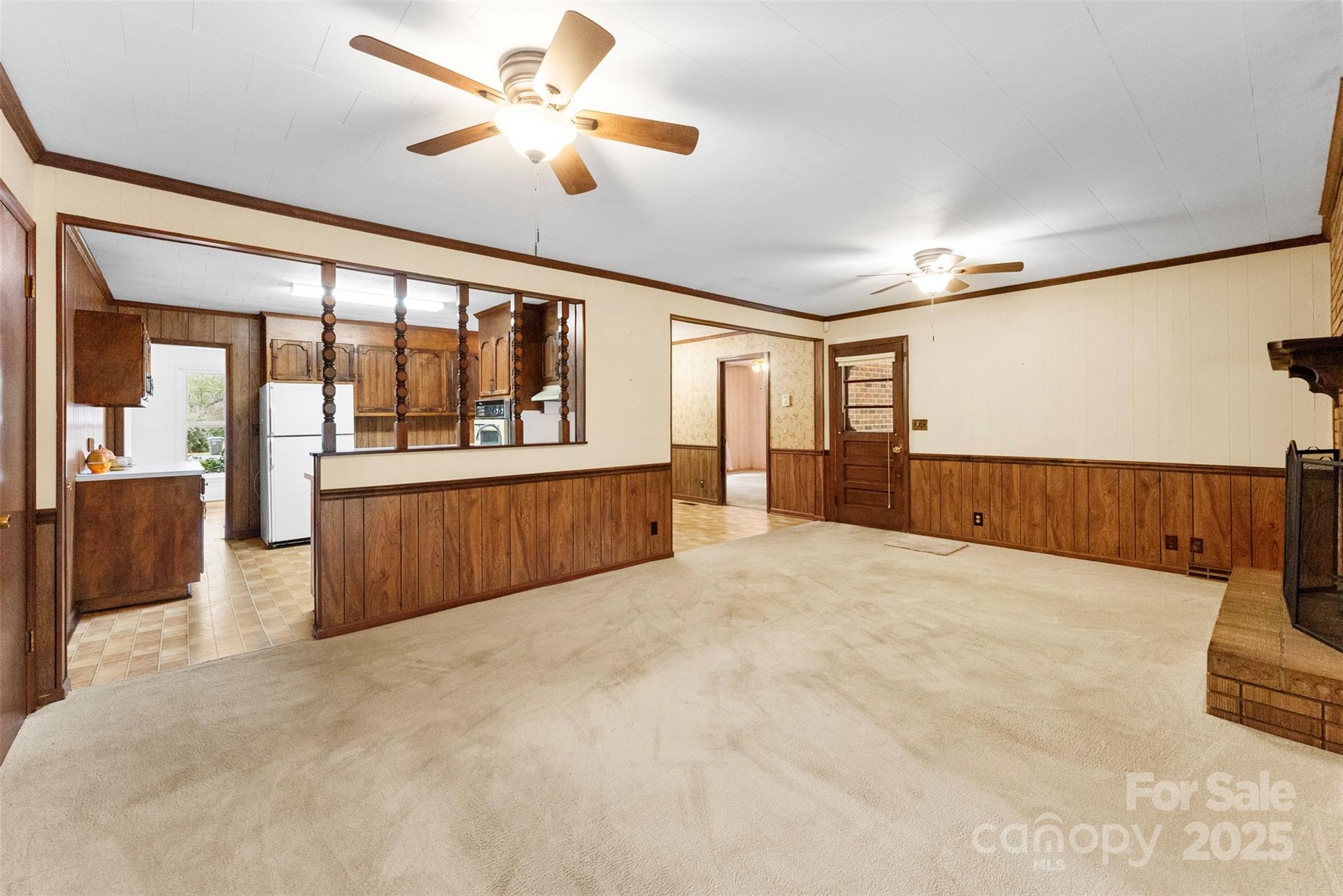 1819 Ratchford Road Dallas, NC 28034 - Photo 11 of 38 a big room with chandelier and windows