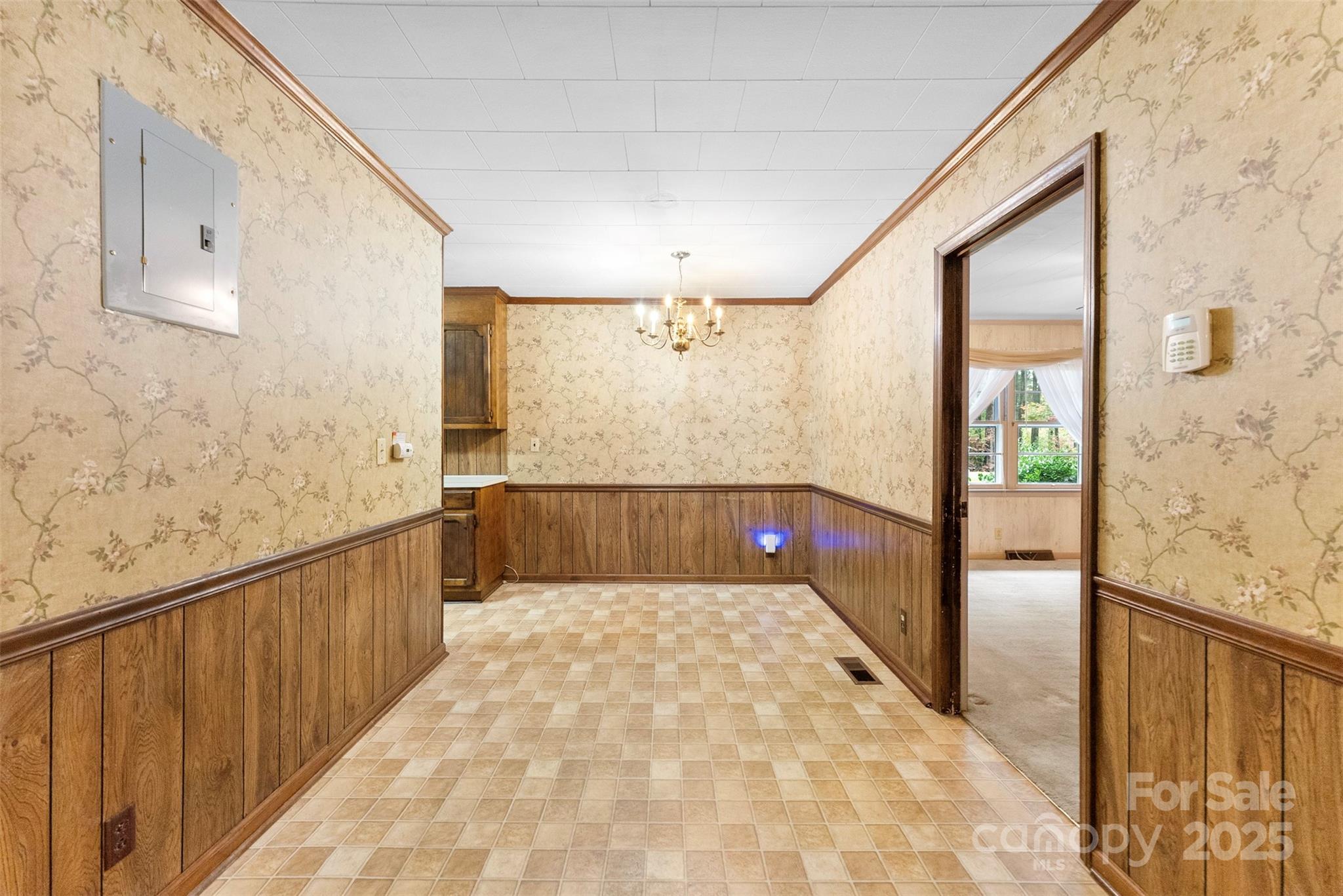1819 Ratchford Road Dallas, NC 28034 - Photo 14 of 38 a view of hallway with wooden floor and chandelier