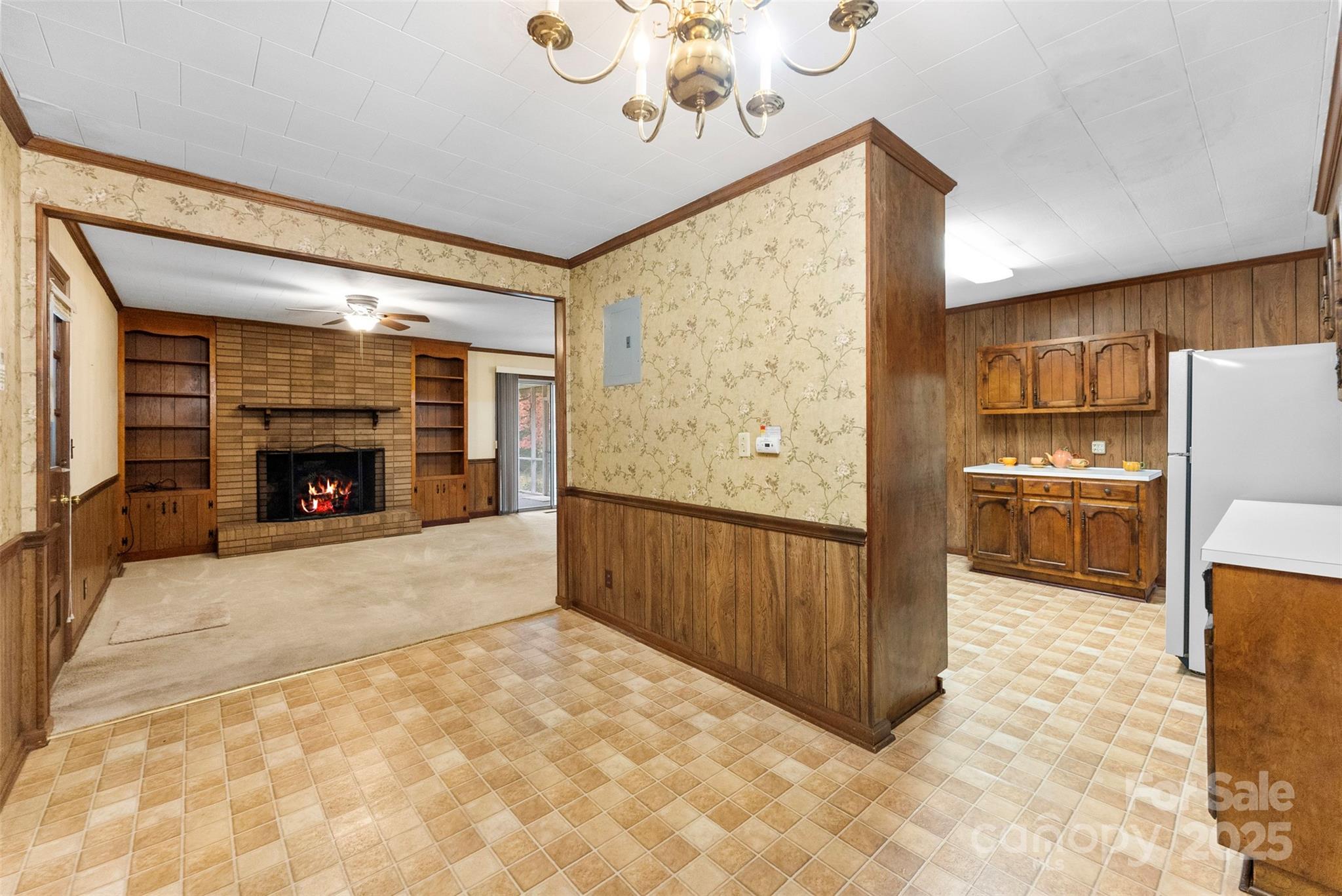 1819 Ratchford Road Dallas, NC 28034 - Photo 15 of 38 a view of a kitchen with a sink and a refrigerator