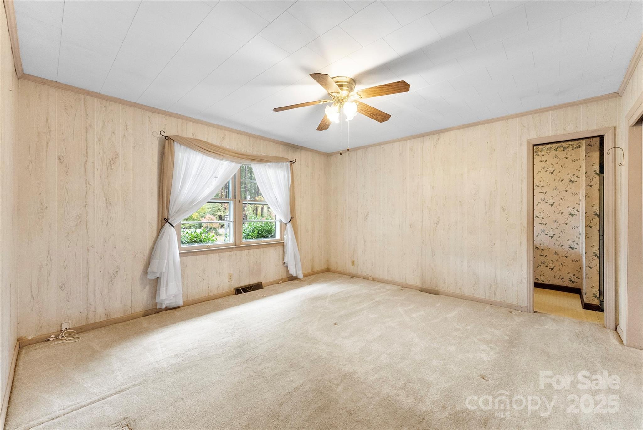 1819 Ratchford Road Dallas, NC 28034 - Photo 20 of 38 a view of an empty room with a window