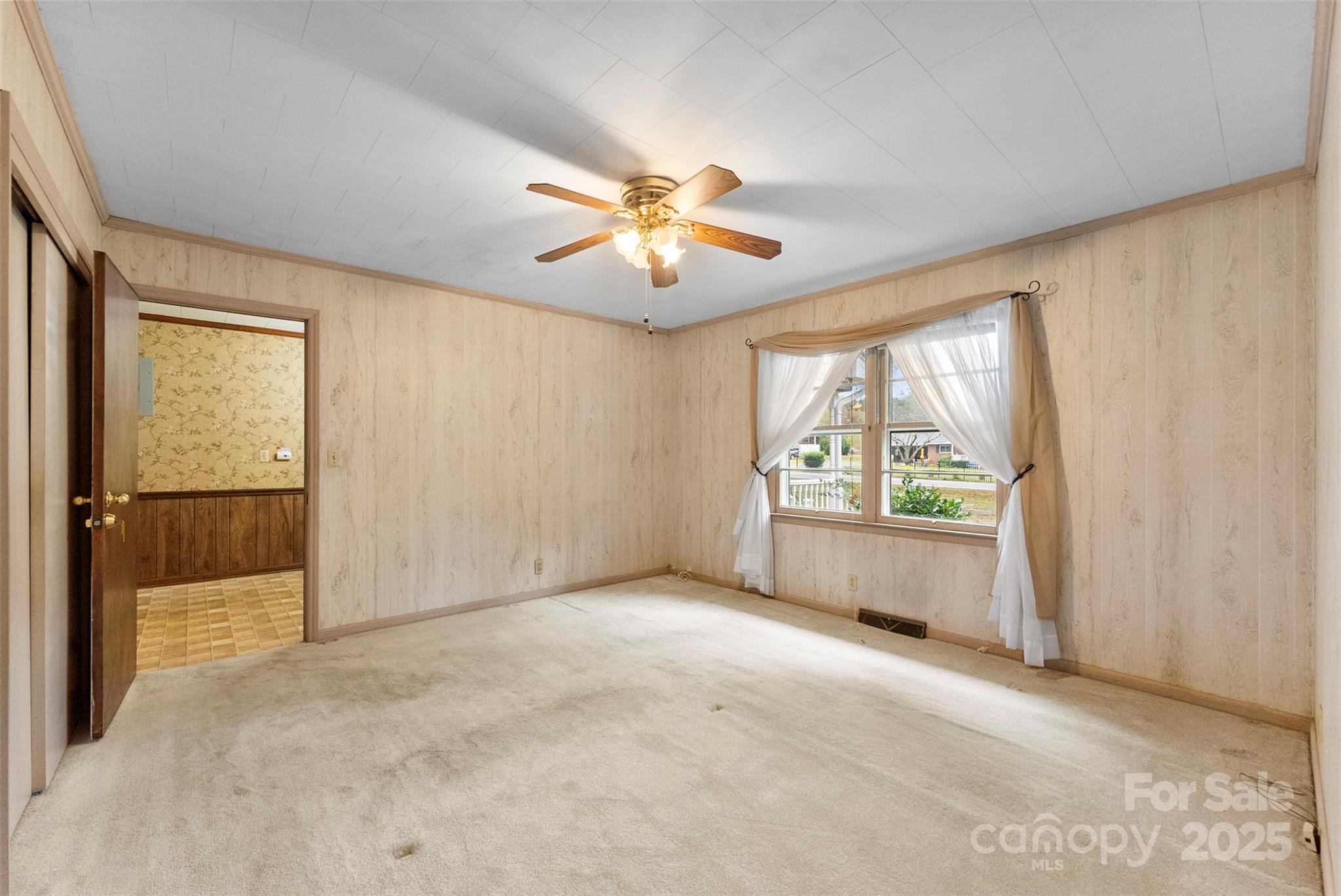 1819 Ratchford Road Dallas, NC 28034 - Photo 22 of 38 wooden floor in an empty room with a window