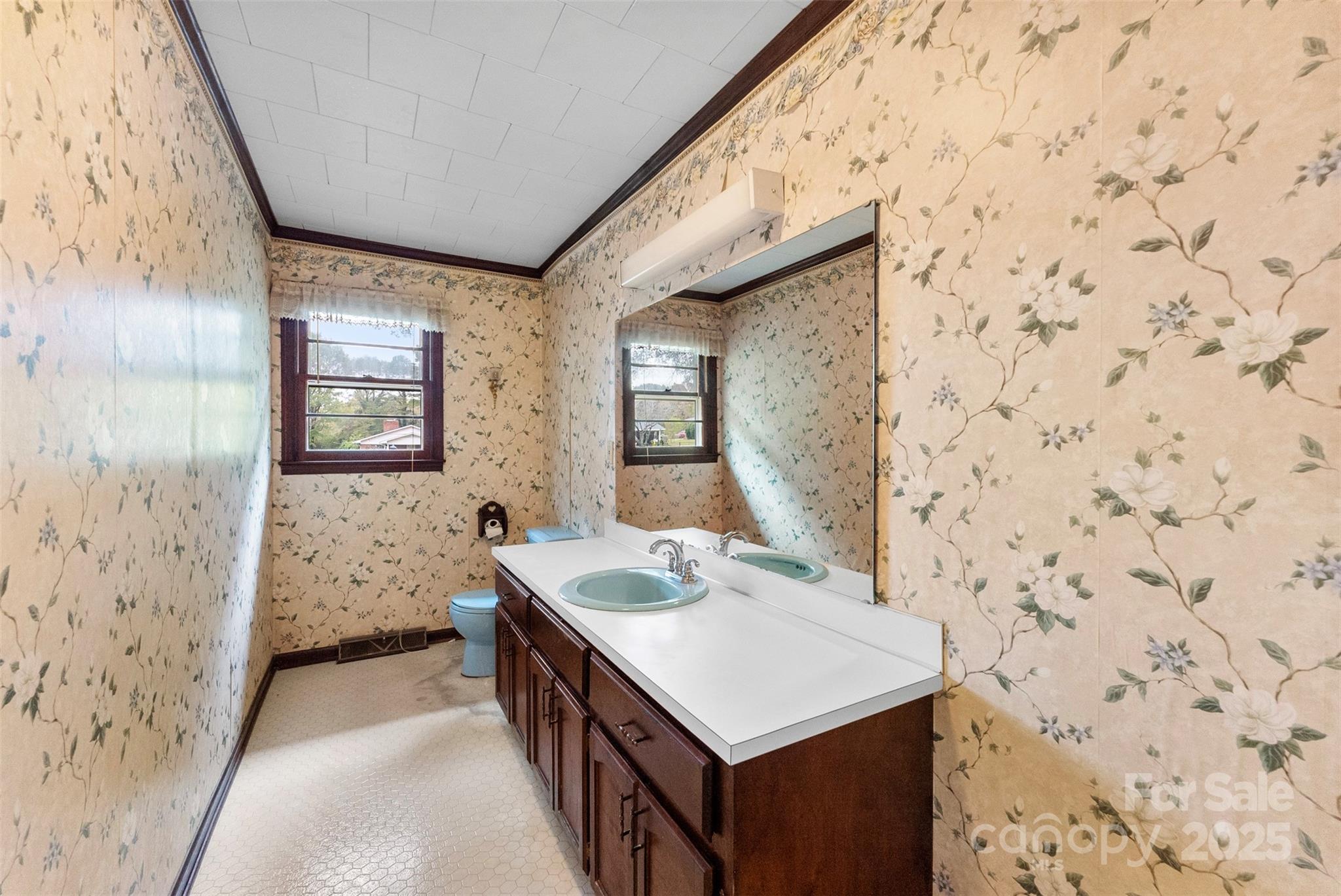 1819 Ratchford Road Dallas, NC 28034 - Photo 26 of 38 a spacious bathroom with a sink a mirror and a shower