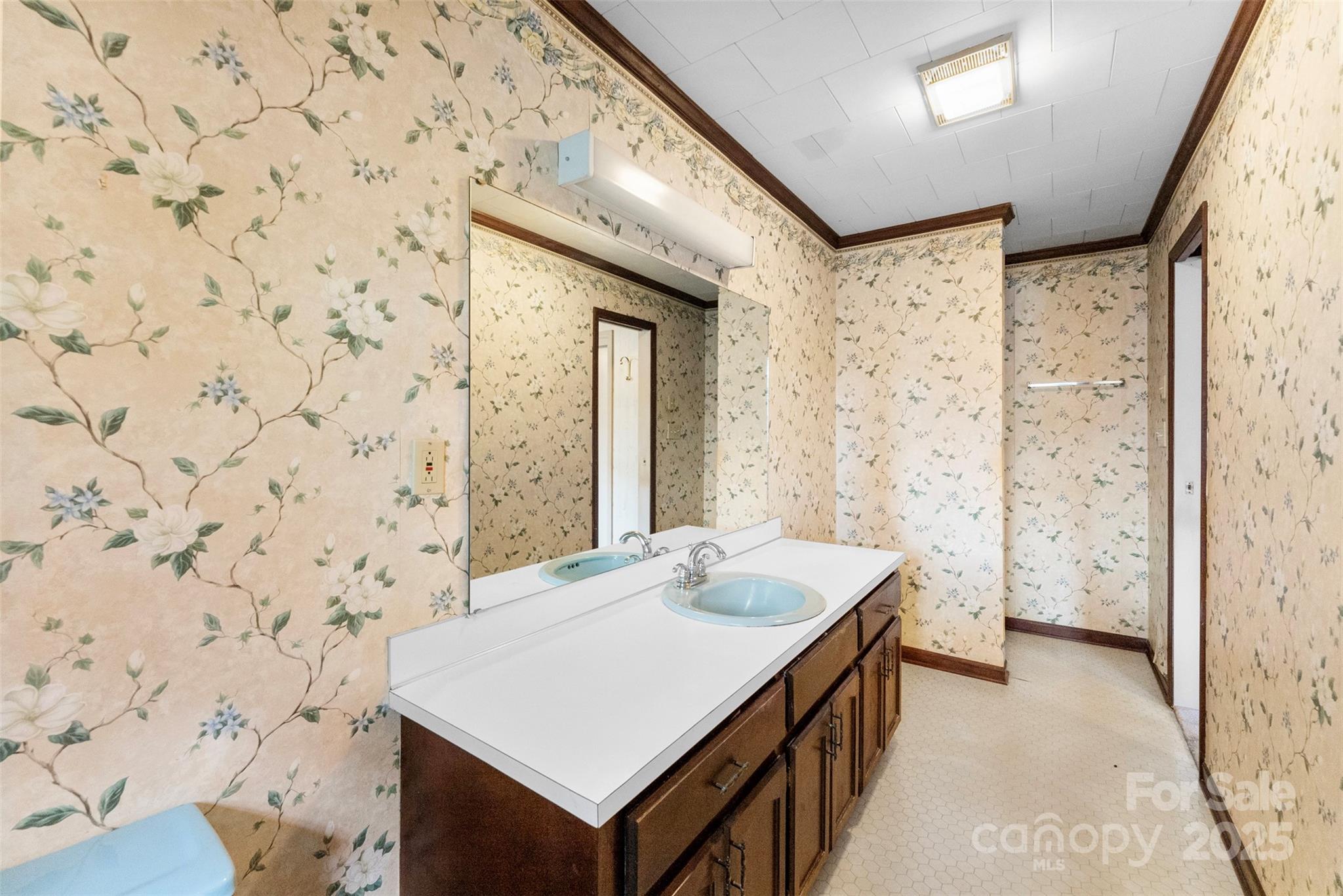 1819 Ratchford Road Dallas, NC 28034 - Photo 27 of 38 a bathroom with a sink and a mirror