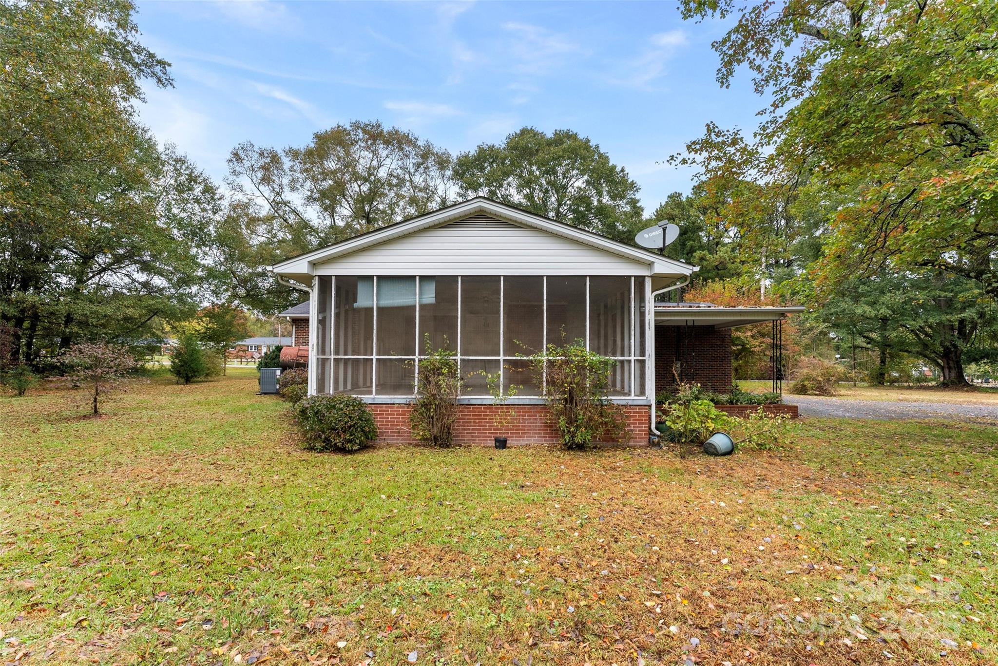 1819 Ratchford Road Dallas, NC 28034 - Photo 35 of 38 a front view of a house with a yard