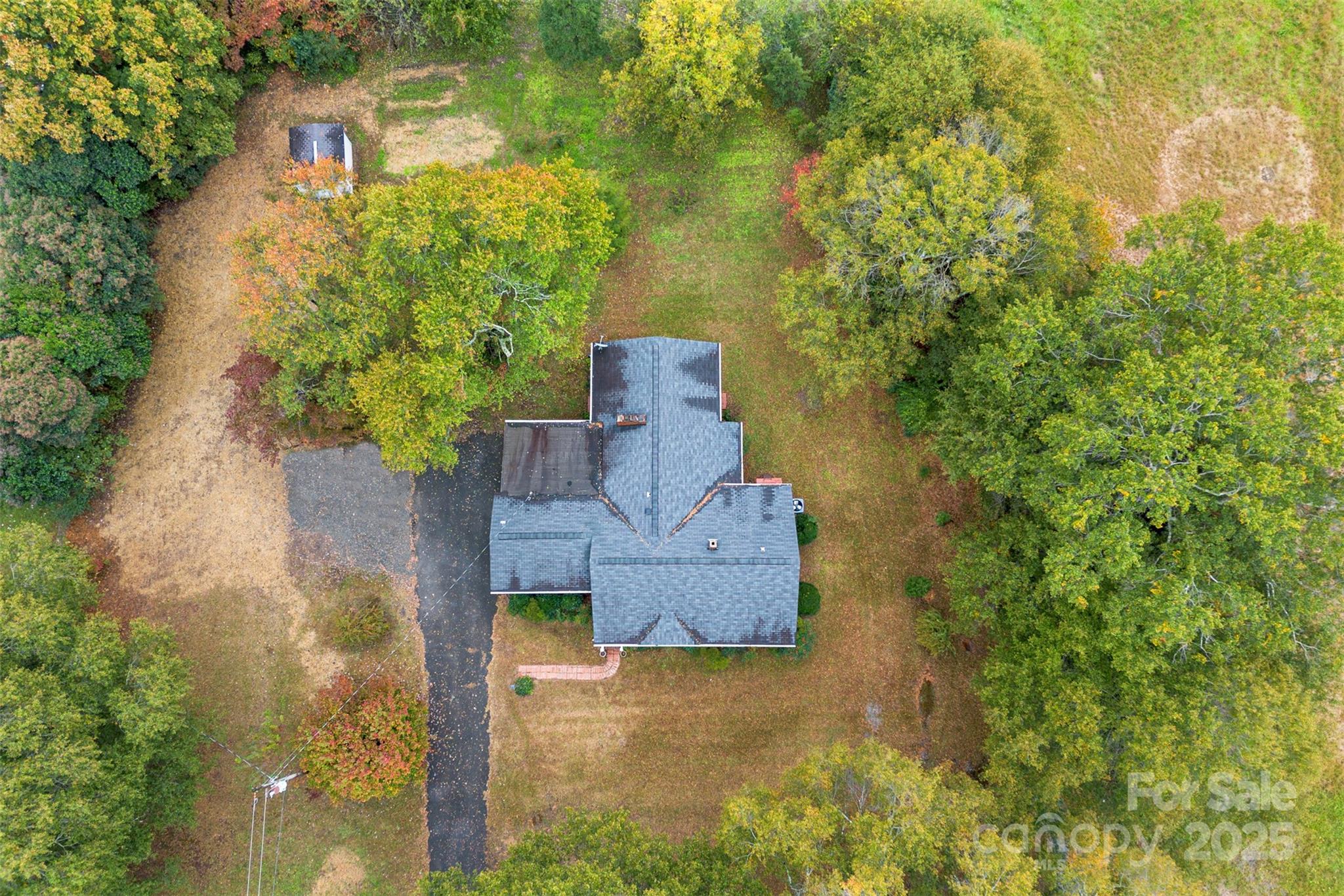 1819 Ratchford Road Dallas, NC 28034 - Photo 38 of 38 an aerial view of a house with a yard