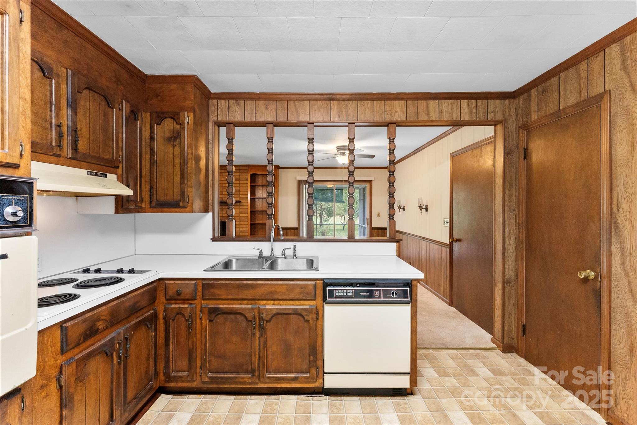 1819 Ratchford Road Dallas, NC 28034 - Photo 8 of 38 a kitchen with stainless steel appliances granite countertop a stove a sink and a refrigerator
