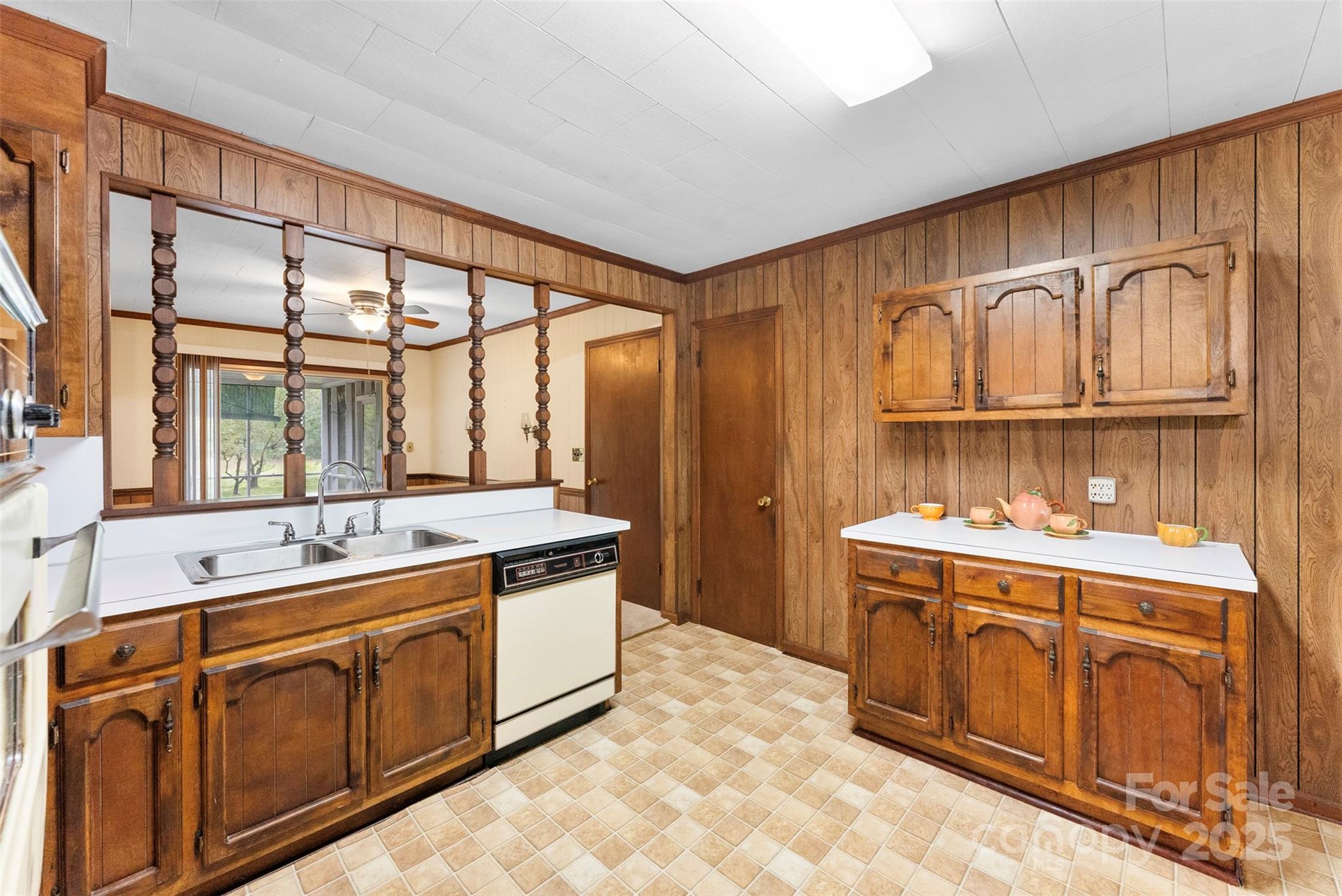 1819 Ratchford Road Dallas, NC 28034 - Photo 9 of 38 a kitchen with a sink stove and cabinets