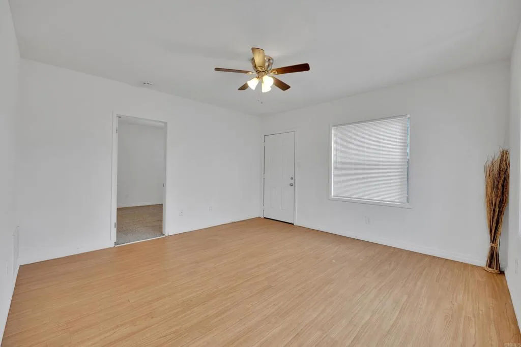 9015 Campo Road Spring Valley, CA 91977 - Photo 30 of 58 a view of empty room with ceiling fan