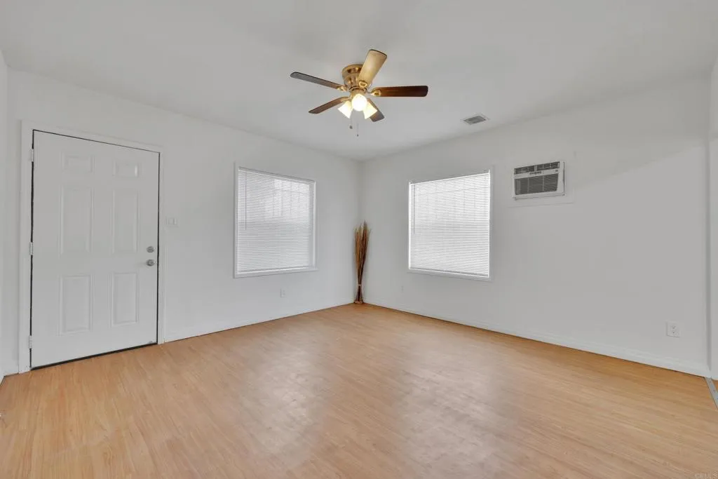 9015 Campo Road Spring Valley, CA 91977 - Photo 31 of 58 a view of an empty room with a window