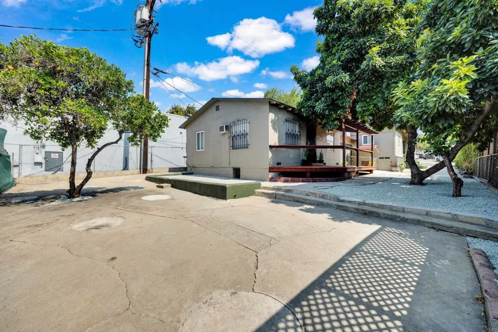 9015 Campo Road Spring Valley, CA 91977 - Photo 46 of 58 a backyard of a house with table and chairs