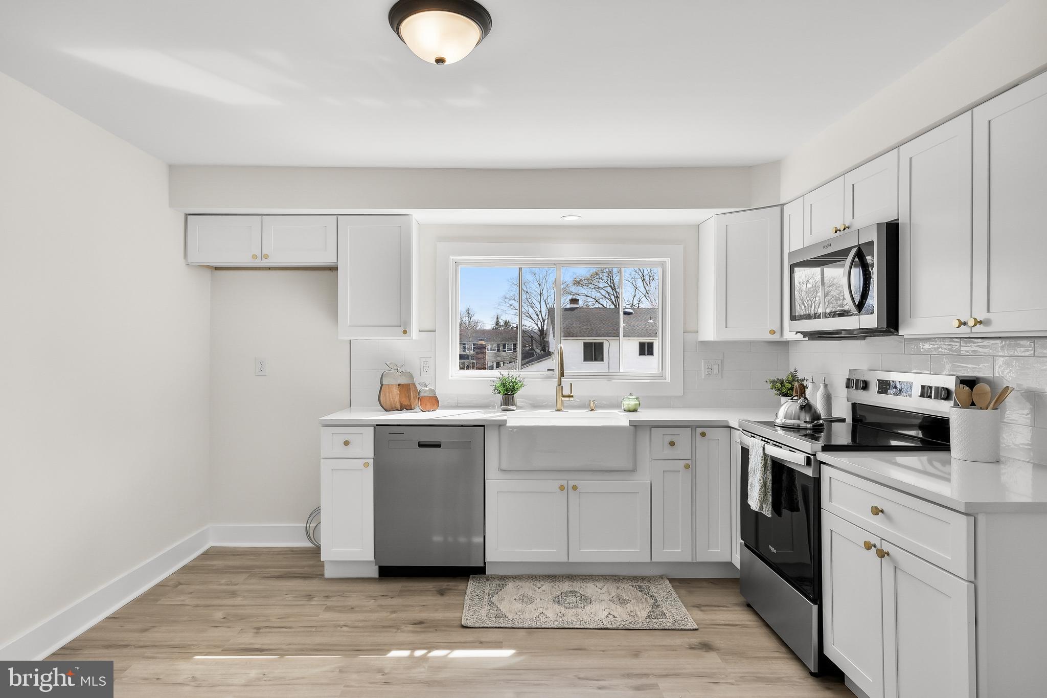 10 Cobblestone Road Cherry Hill, NJ 08003 - Photo 7 of 15 a view of a kitchen with a sink