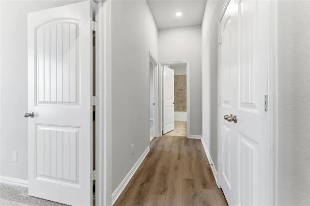 a view of an empty room and a window