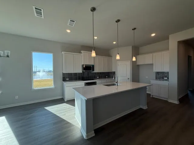 en view of an empty room with a window