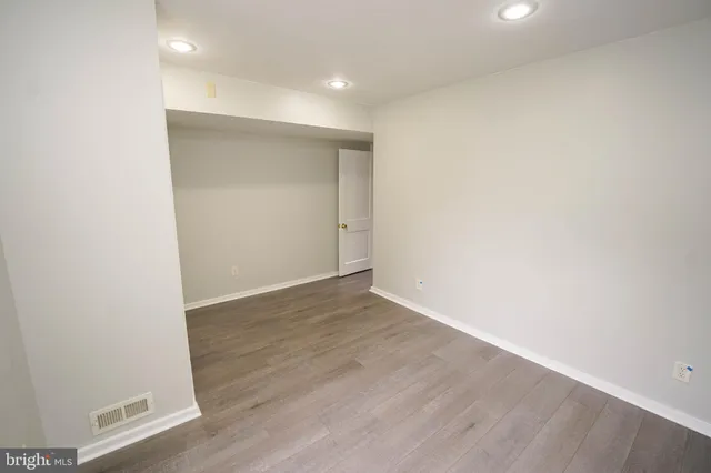 a utility room with a sink dryer and washer