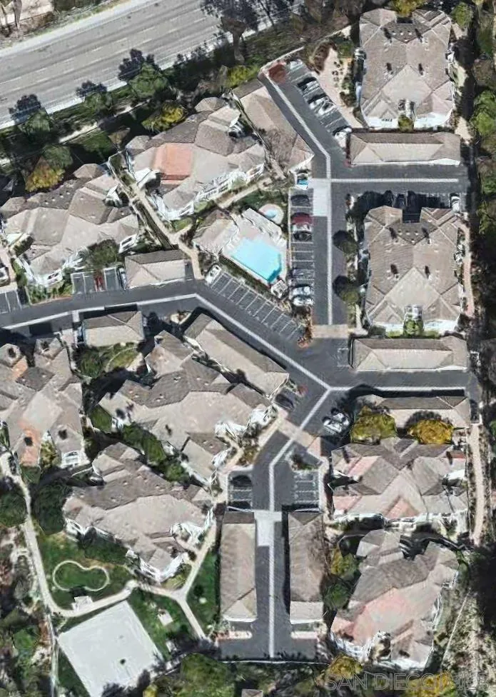an aerial view of a house with a garden