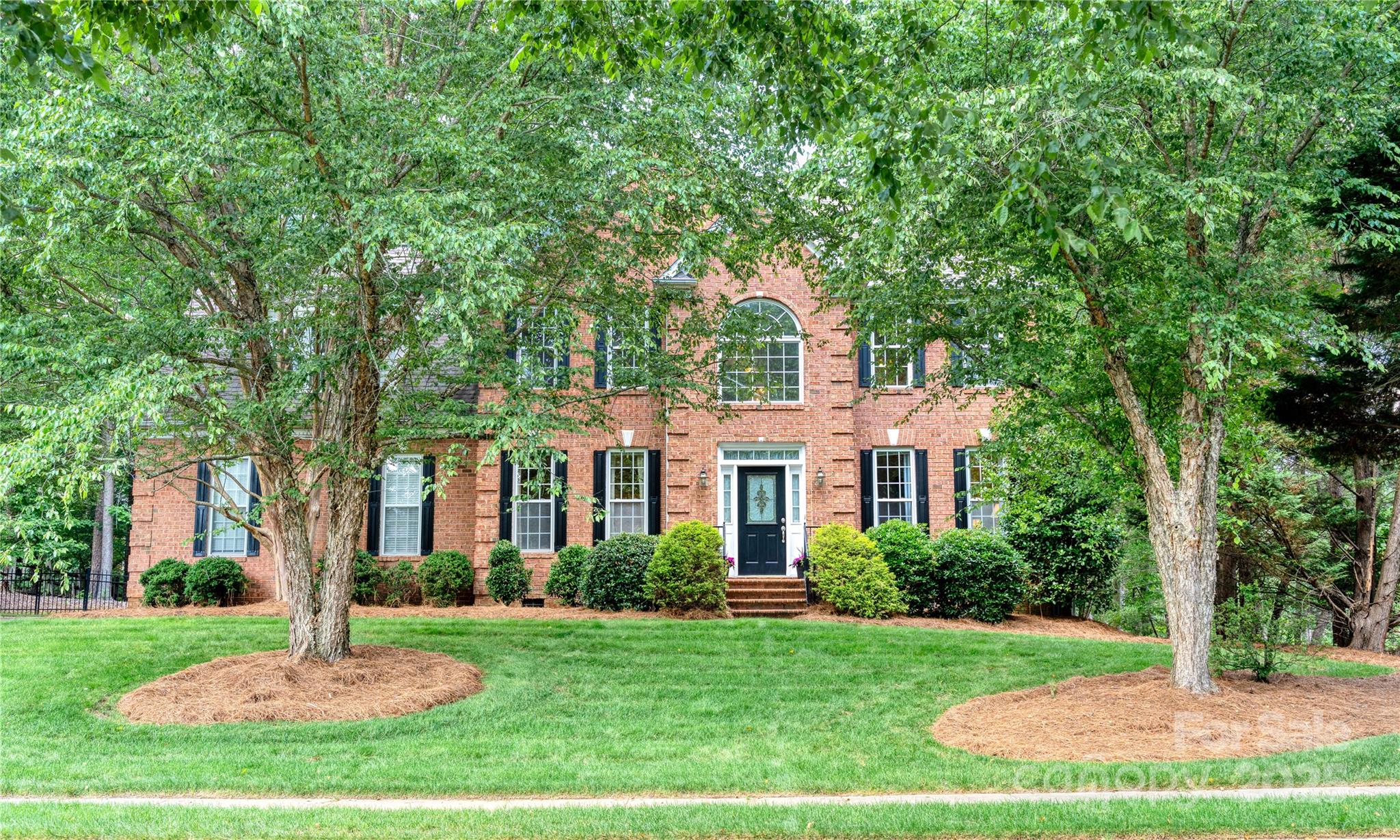 3112 Planters Ridge Road Charlotte, NC 28270 - Photo 1 of 1 a front view of a house with a yard
