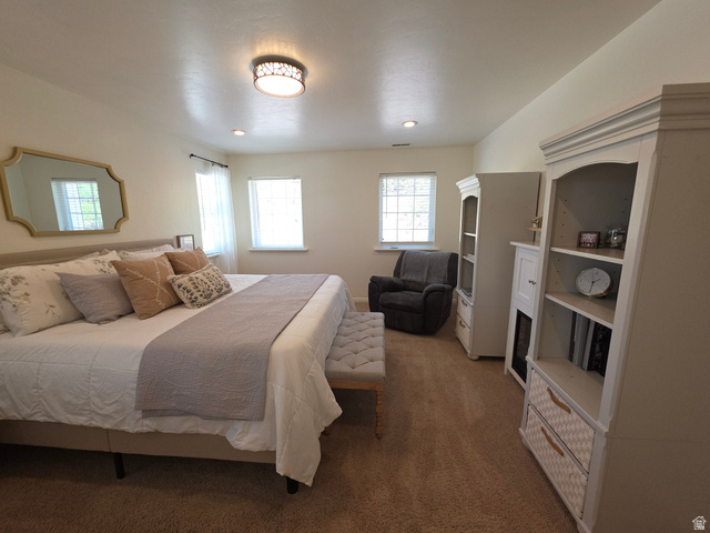 387 North Loafer Canyon Road Payson, UT 84651 - Photo 33 of 94 Carpeted bedroom featuring two windows with white blinds, a decorative ceiling light fixture, and recessed lighting