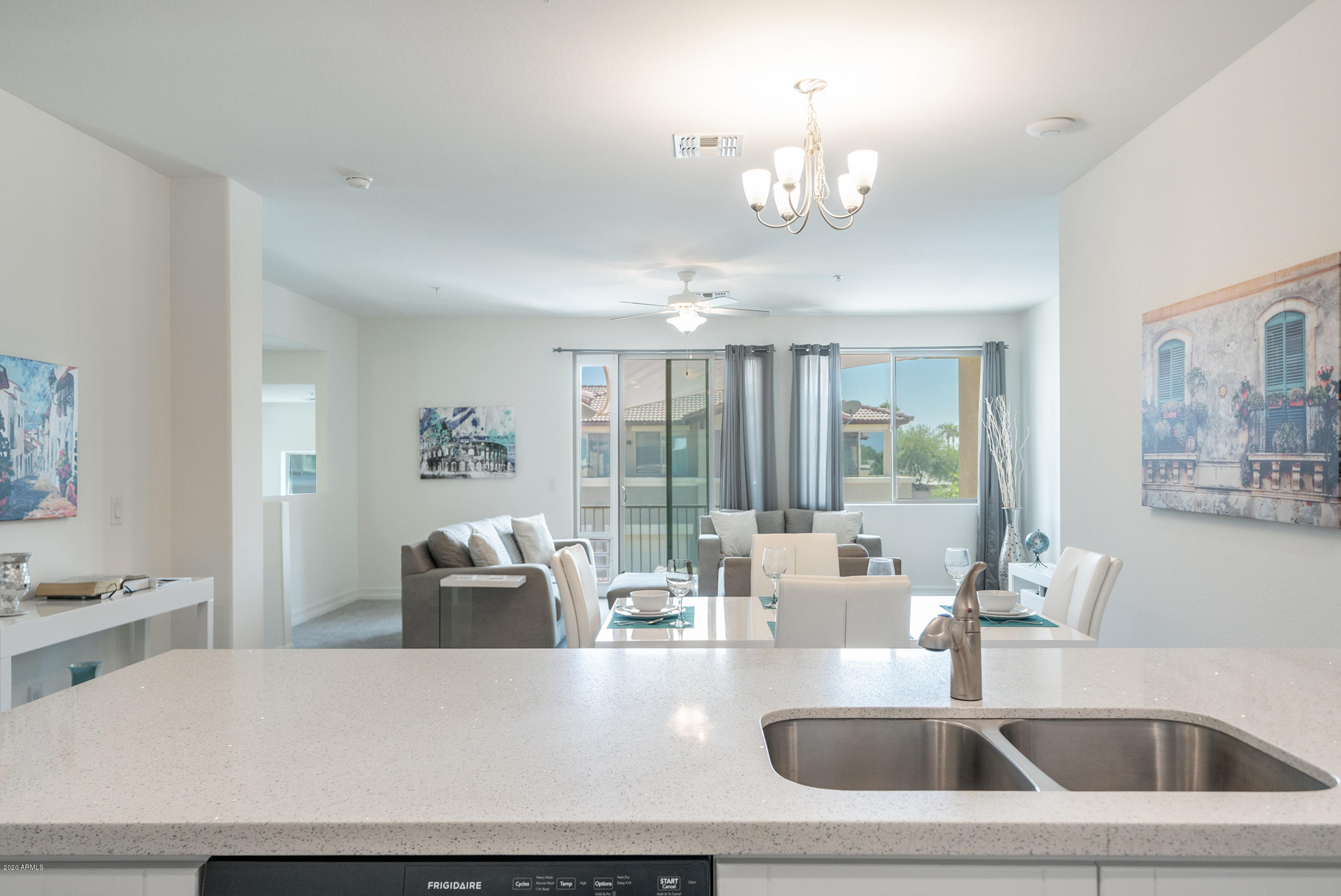 7820 East Baseline Road, Unit 208 Mesa, AZ 85209 - Photo 16 of 29 a kitchen with a sink and a large mirror