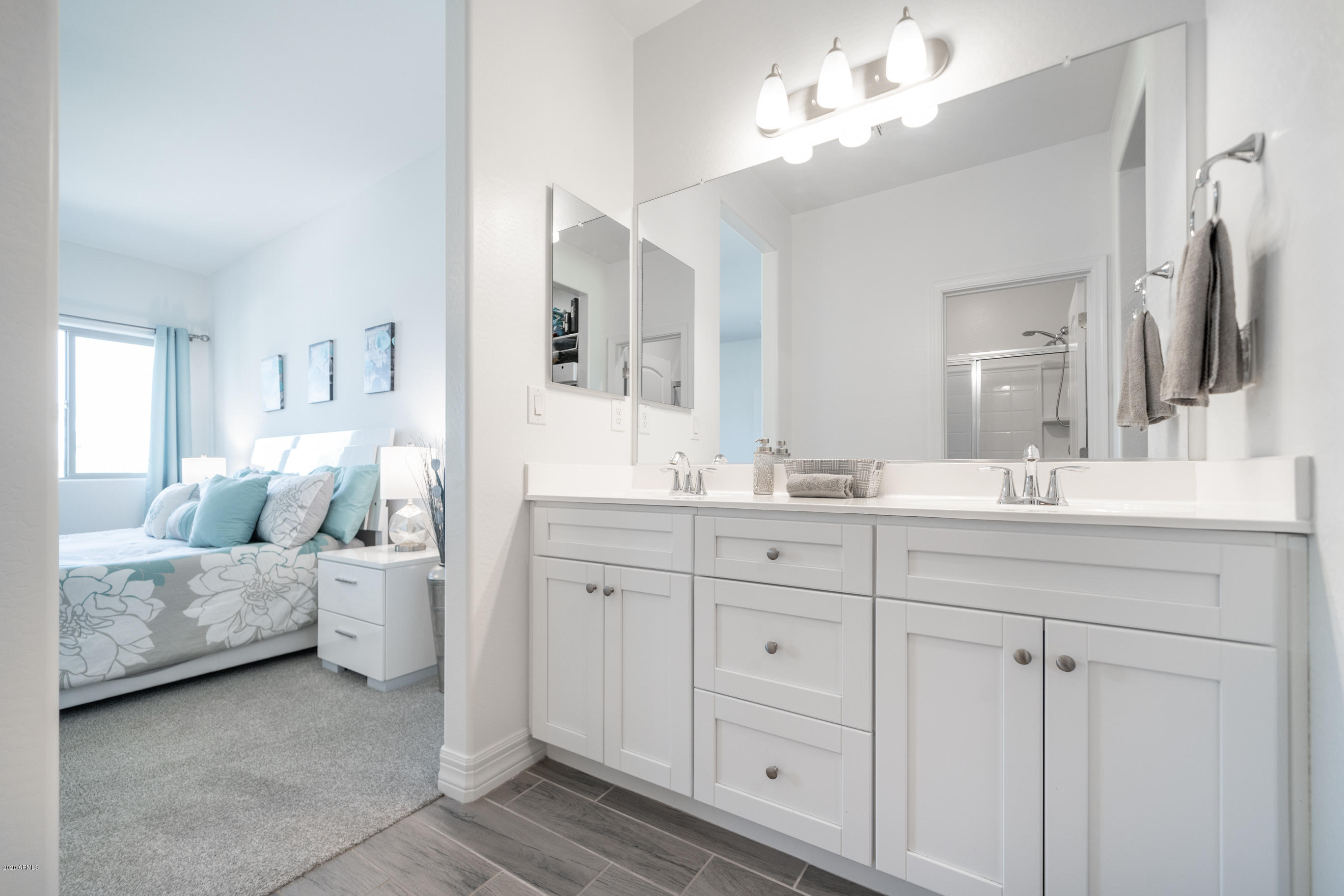 7820 East Baseline Road, Unit 208 Mesa, AZ 85209 - Photo 24 of 29 a spacious bathroom with a double vanity sink and a mirror