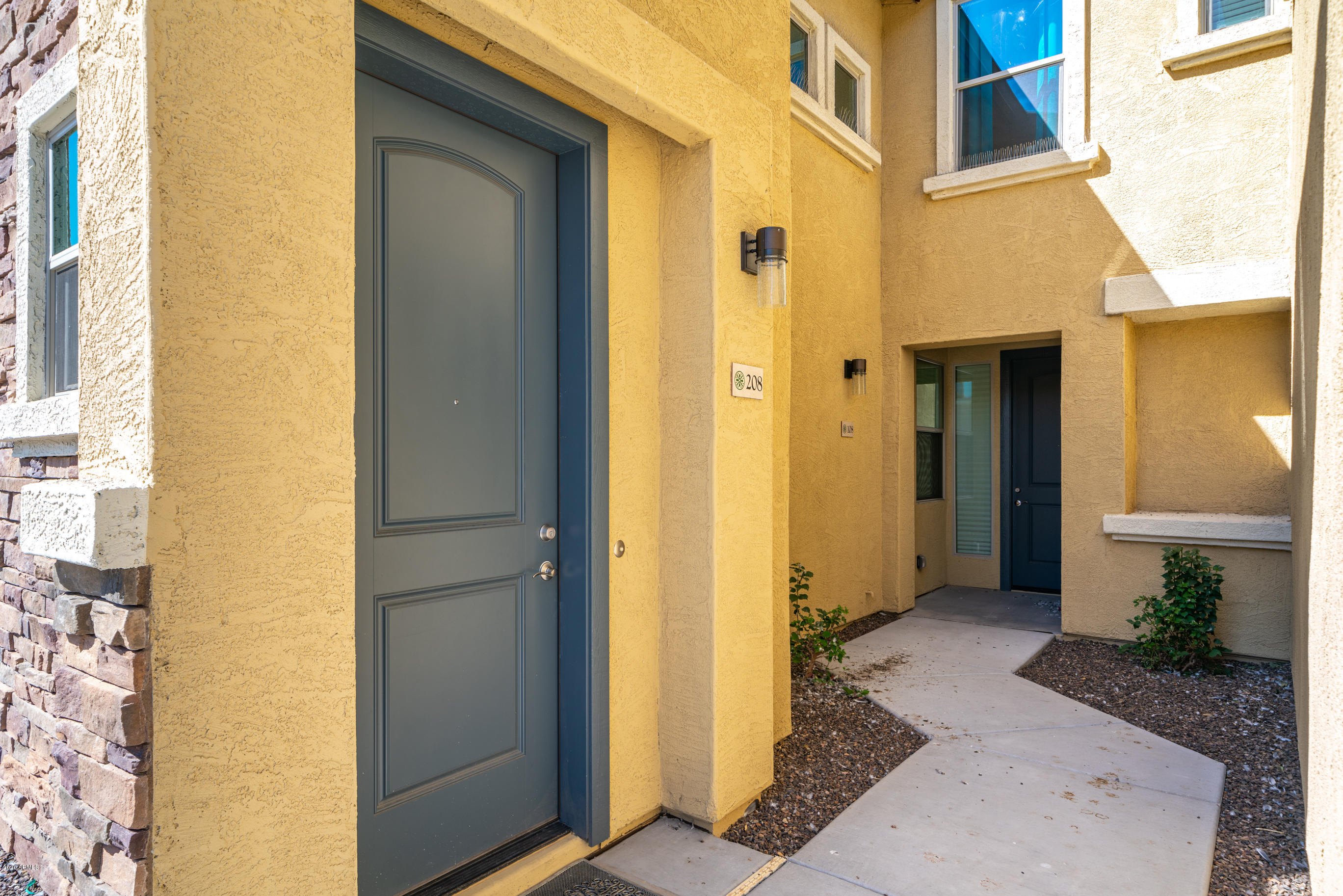 7820 East Baseline Road, Unit 208 Mesa, AZ 85209 - Photo 3 of 29 a view of a bathroom with a door