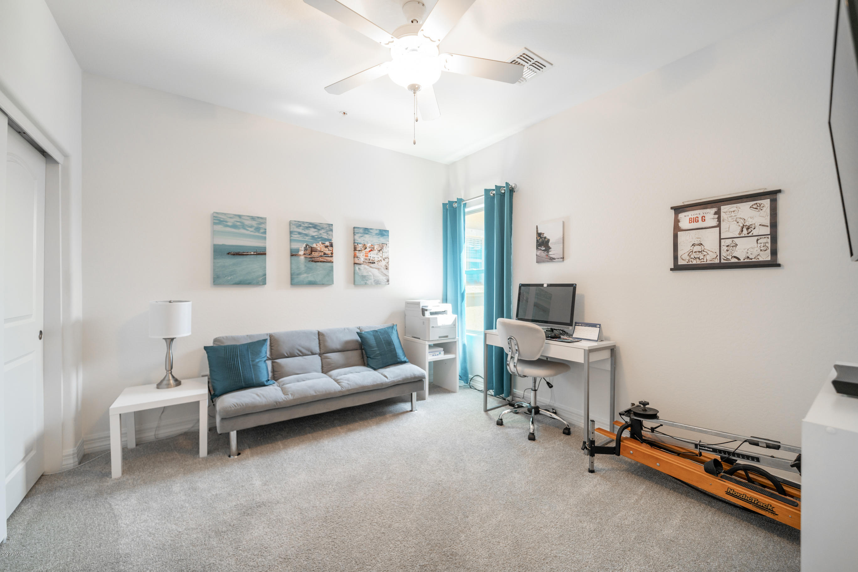 7820 East Baseline Road, Unit 208 Mesa, AZ 85209 - Photo 6 of 29 a living room with furniture and a chandelier