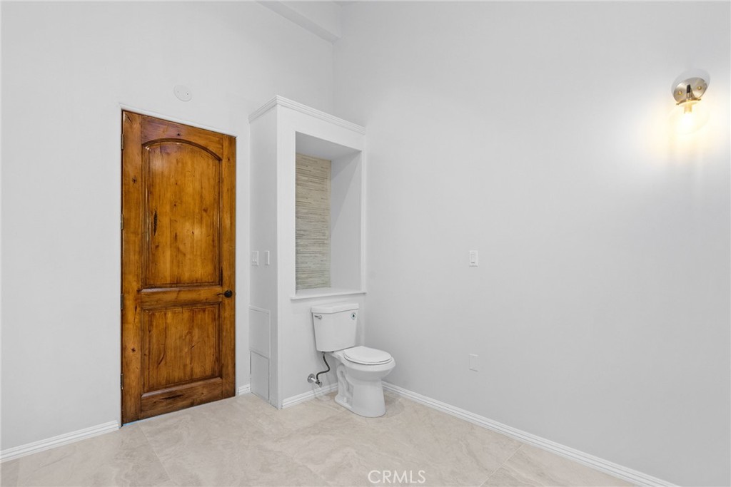 51422 Partington Ridge Road Big Sur, CA 93920 - Photo 24 of 36 a bathroom with a toilet