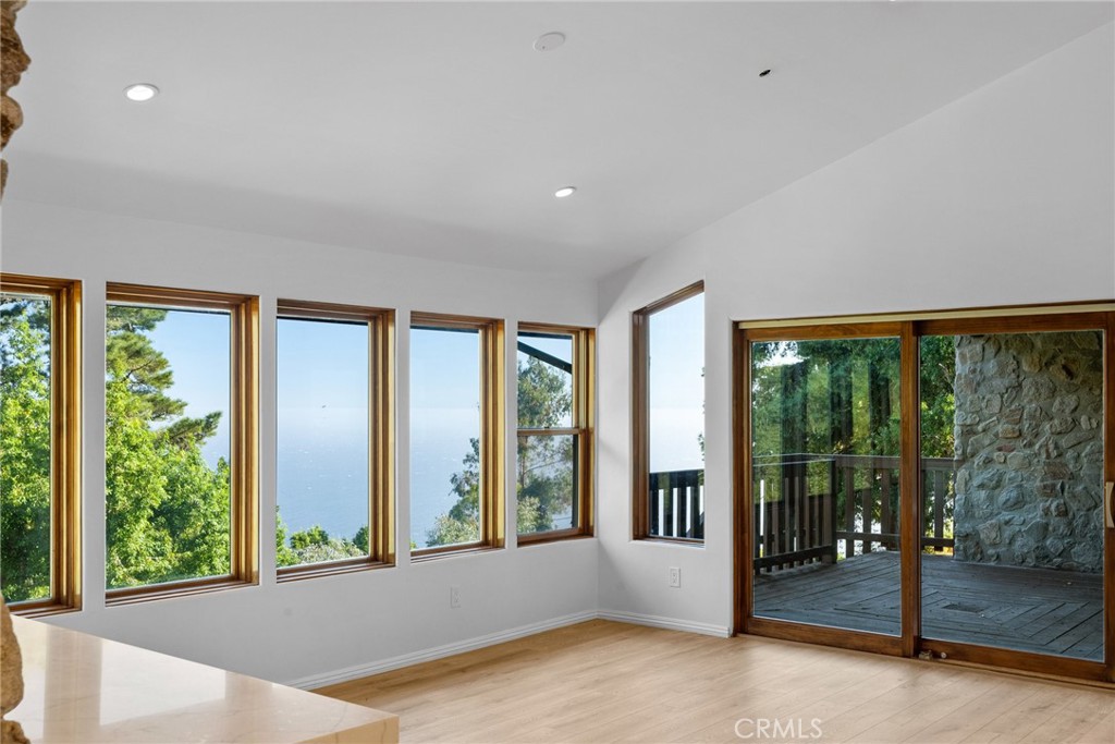 51422 Partington Ridge Road Big Sur, CA 93920 - Photo 9 of 36 a view of an empty room with a large window