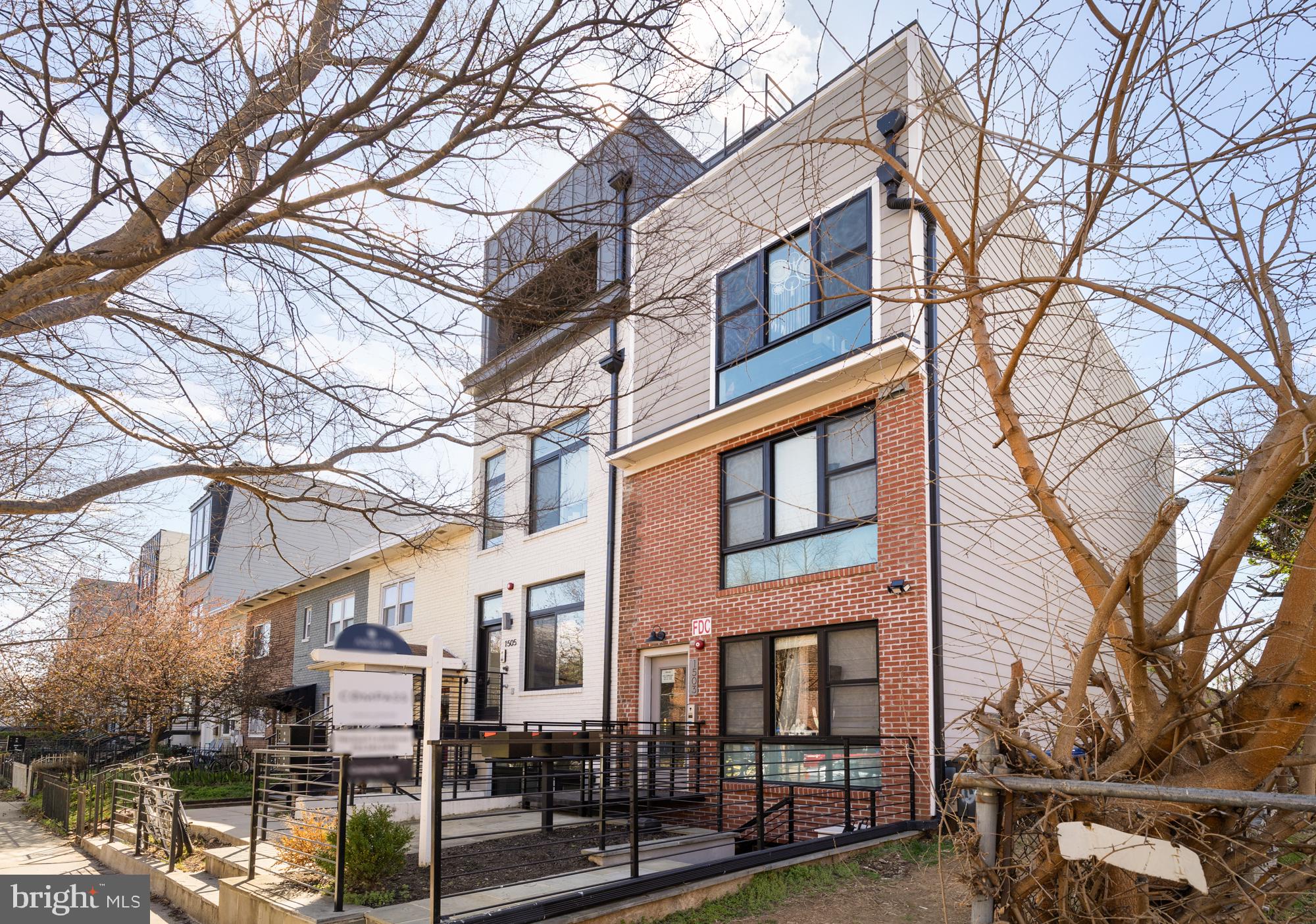 1503 K Street Southeast, Unit C01 Washington, DC 20003 - Photo 1 of 16 a view of a building with a snow