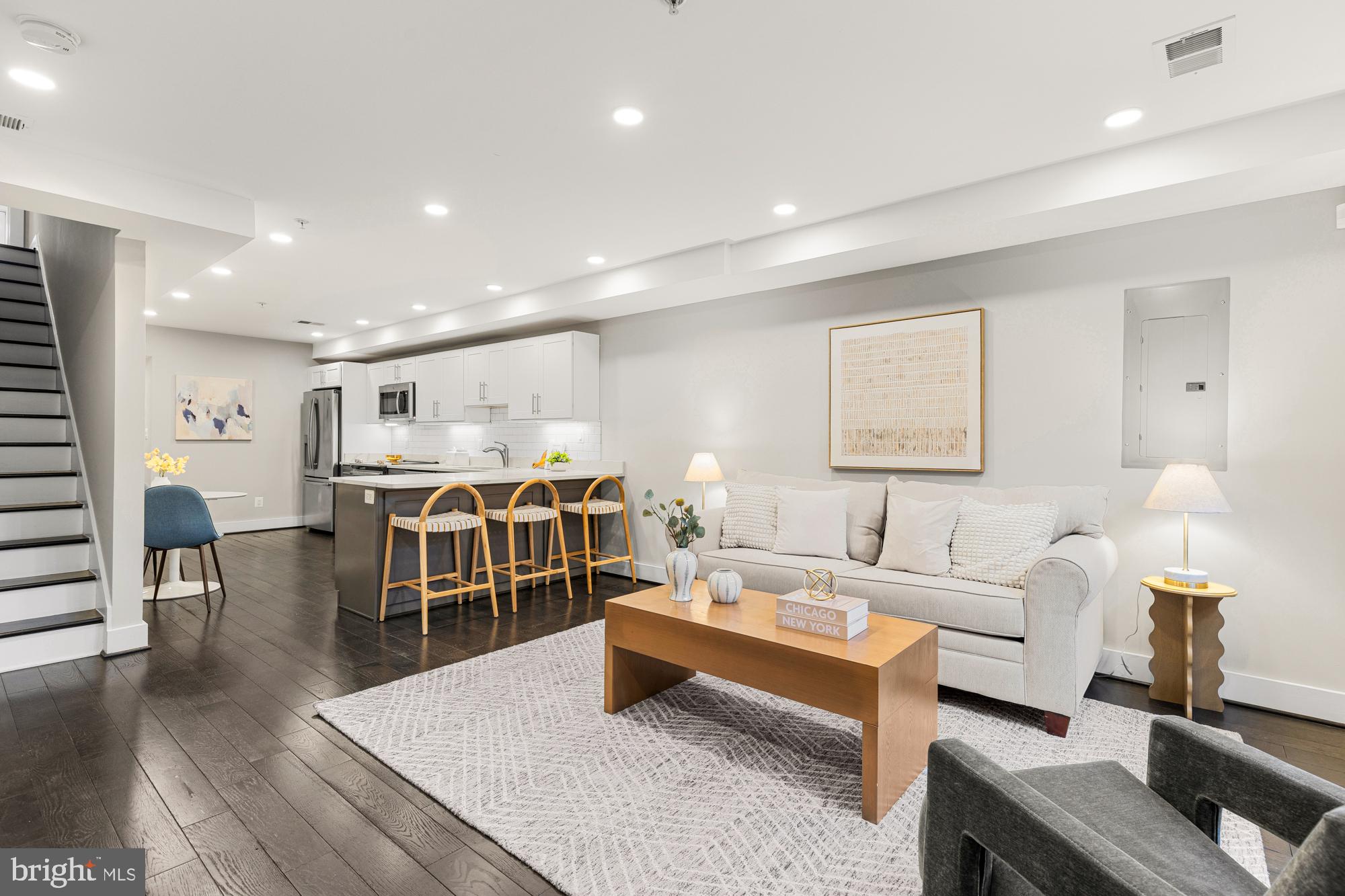 1503 K Street Southeast, Unit C01 Washington, DC 20003 - Photo 2 of 16 a living room with furniture and wooden floor