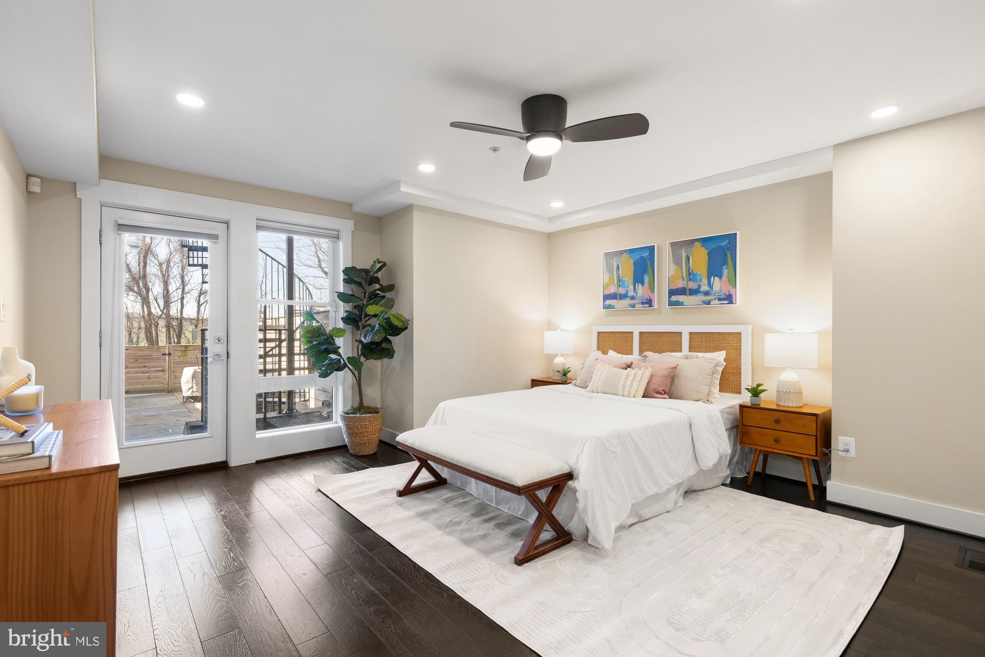 1503 K Street Southeast, Unit C01 Washington, DC 20003 - Photo 8 of 16 a bedroom with a bed and a large window