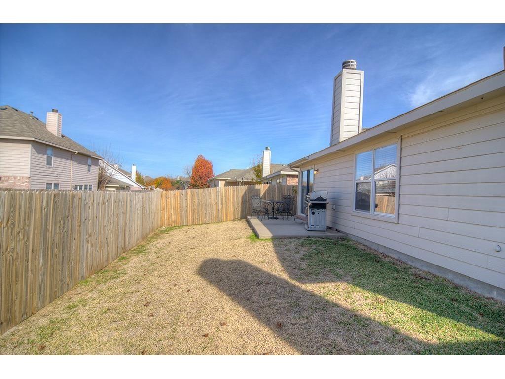 13109 Fieldstone Road Fort Worth, TX 76244 - Photo 22 of 25 Fenced backyard with a patio