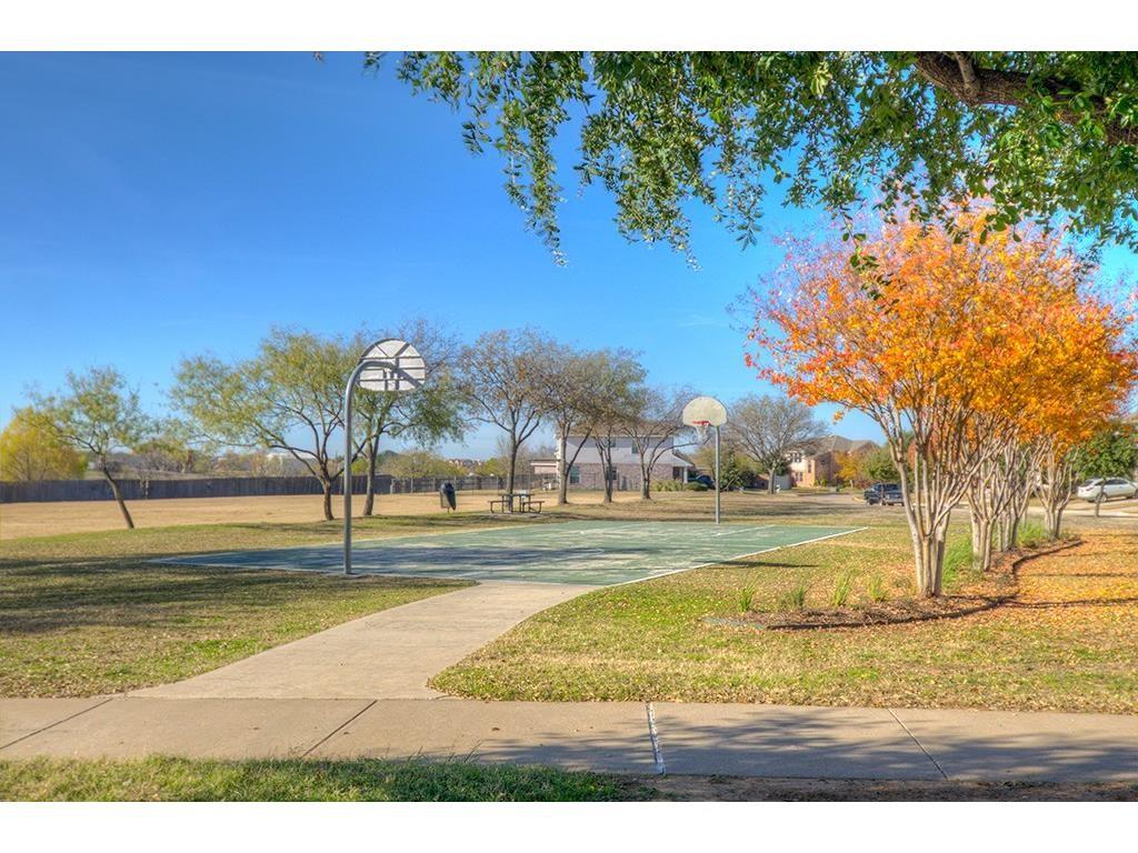 13109 Fieldstone Road Fort Worth, TX 76244 - Photo 23 of 25 View of basketball court with community basketball court and a lawn
