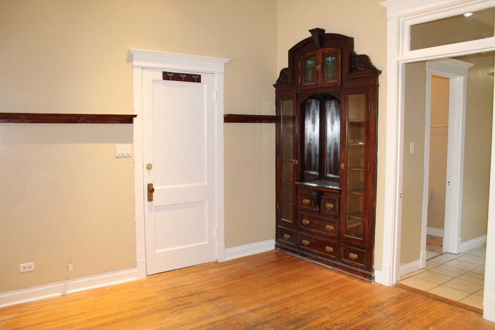 2252 West Cermak Road, Unit 2 Chicago, IL 60608 - Photo 3 of 10 a view of a hallway with wooden floor