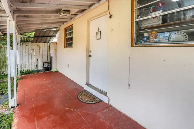 a view of a room with rack on the wall