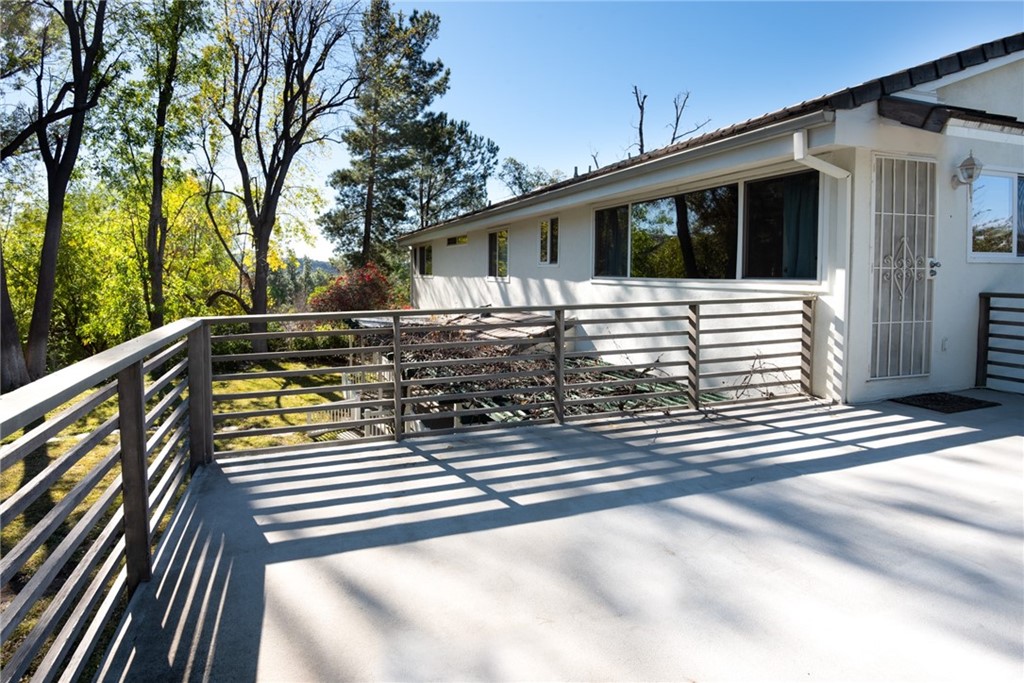 20140 Adele Drive Woodland Hills, CA 91364 - Photo 11 of 20 a view of a house with a deck