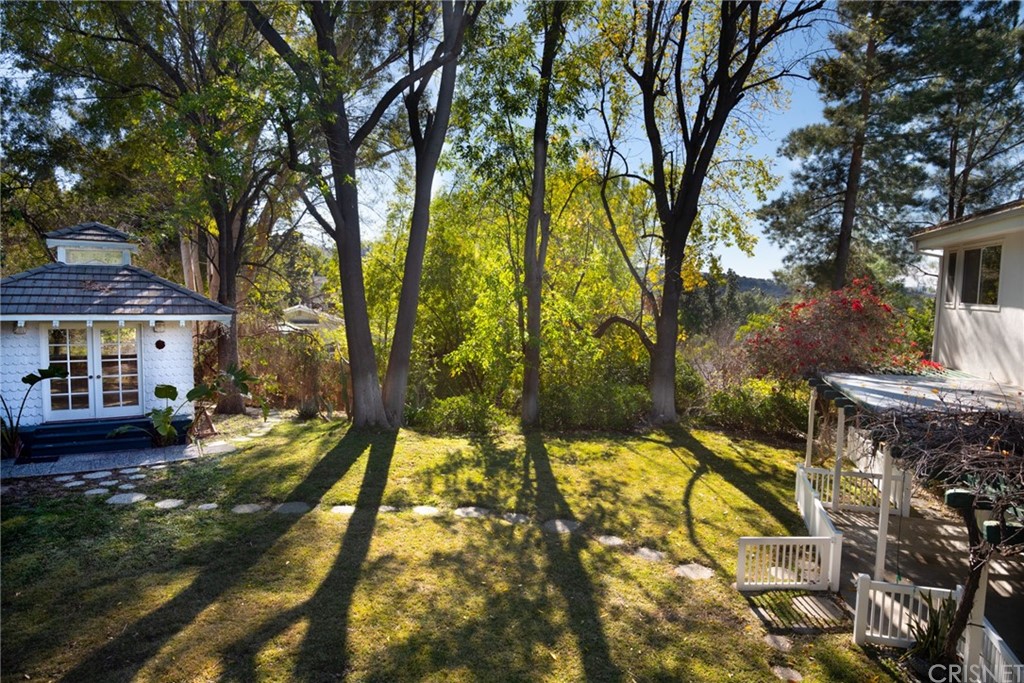 20140 Adele Drive Woodland Hills, CA 91364 - Photo 12 of 20 a view of house with yard and sitting area