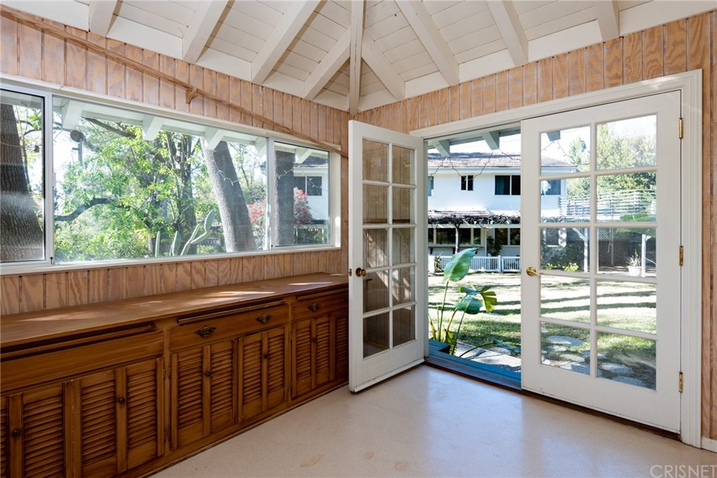 20140 Adele Drive Woodland Hills, CA 91364 - Photo 18 of 20 a view of a two room with wooden floor and outdoor space