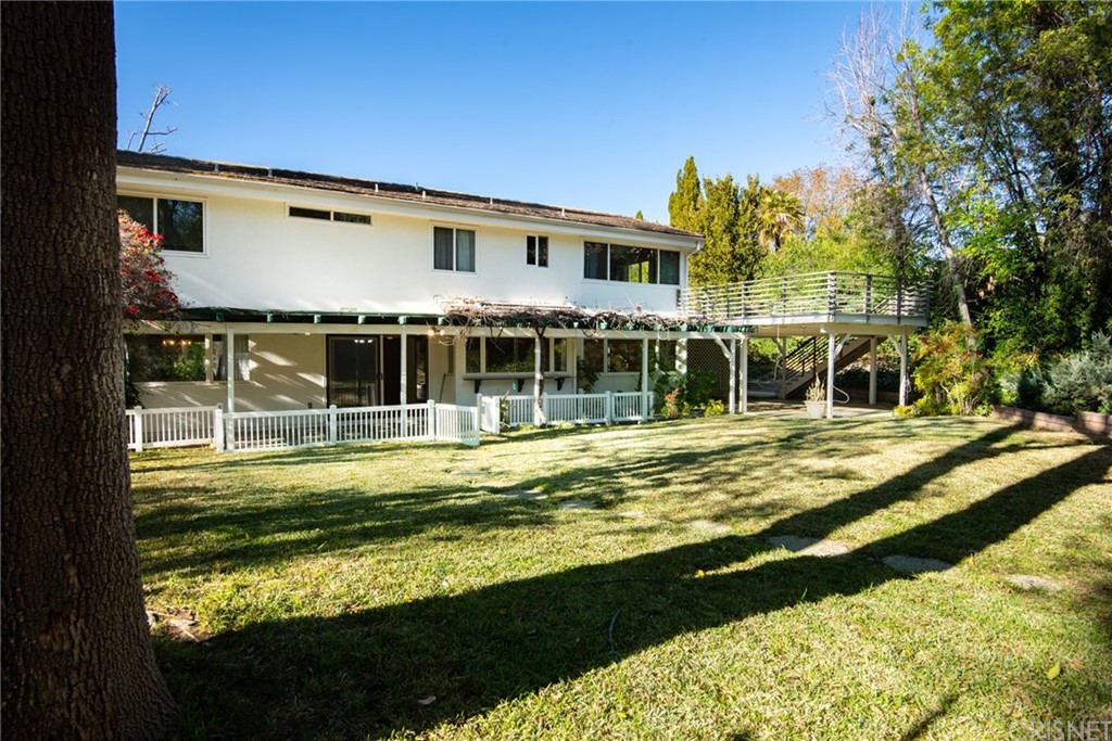 20140 Adele Drive Woodland Hills, CA 91364 - Photo 19 of 20 a view of a house with swimming pool