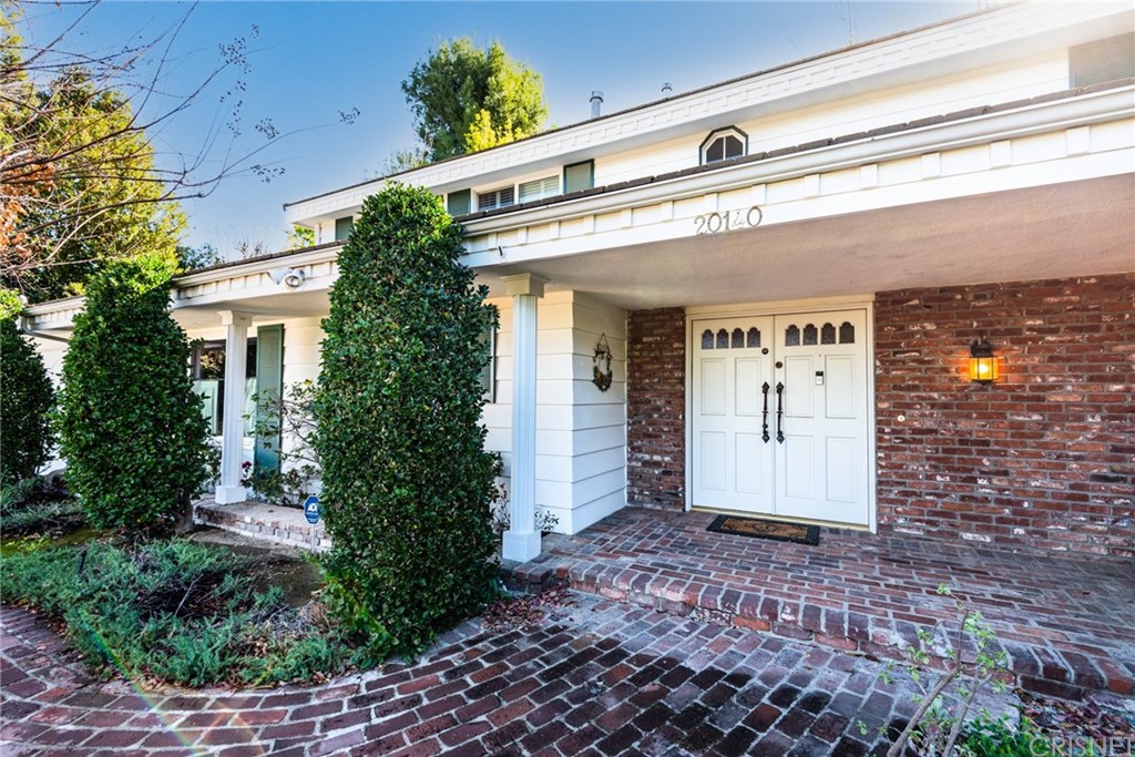 20140 Adele Drive Woodland Hills, CA 91364 - Photo 6 of 20 a view of a building with entryway