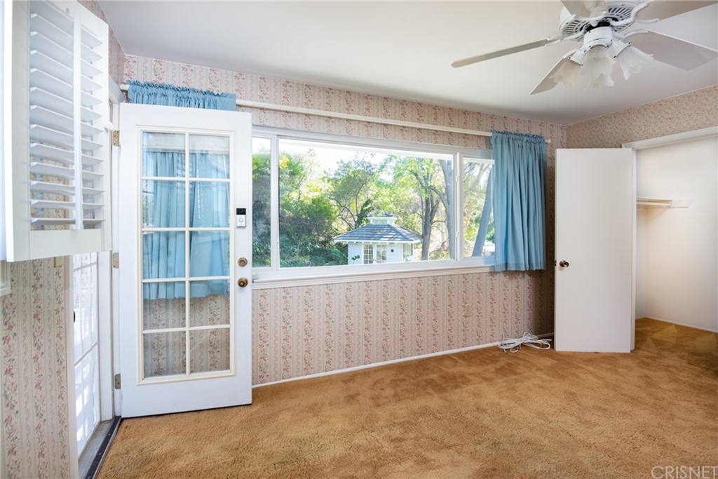 20140 Adele Drive Woodland Hills, CA 91364 - Photo 9 of 20 a view of an empty room with a window