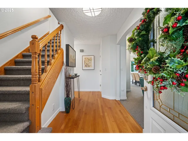 a view of entryway with flower pots