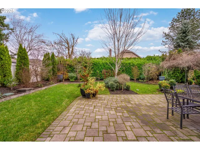 a view of a patio with a yard